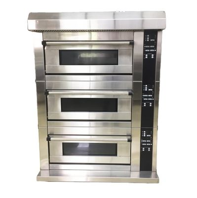 Le pain de noix de coco rondes est facilité à cuire avec une grande cuisinière à la boulangerie Pie Long Loaf