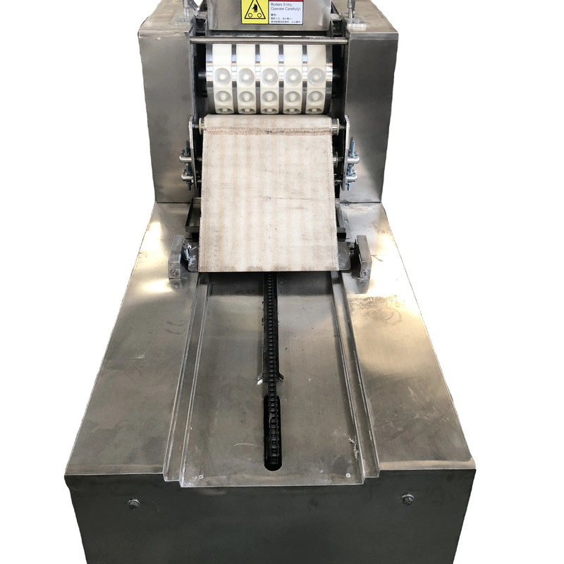 La machine de dépôt de biscuits électrique est une solution unique pour les besoins de fabrication de biscuits industriels